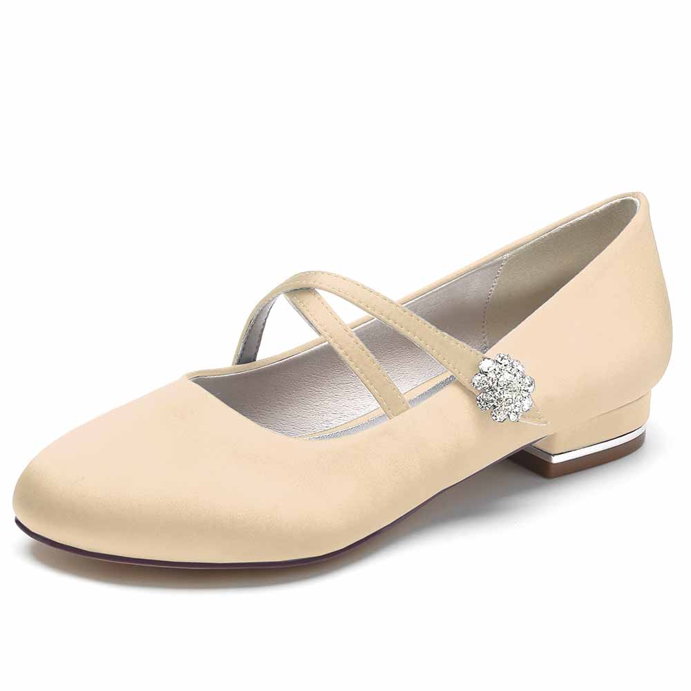 Elegant satin bridal flats with cross straps and a decorative jewel for stylish wedding footwear
