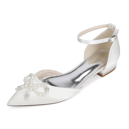 Elegant satin bridal flats with pearl embellishments and ankle strap for weddings