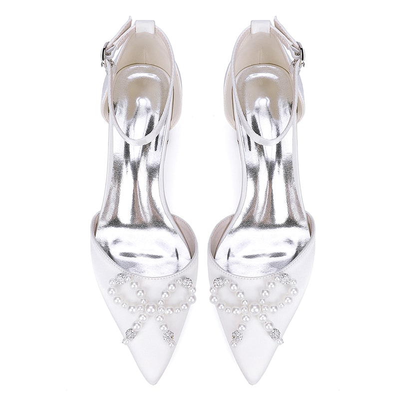 Elegant satin bridal flats with a pointed toe and pearl embellishments, perfect for weddings