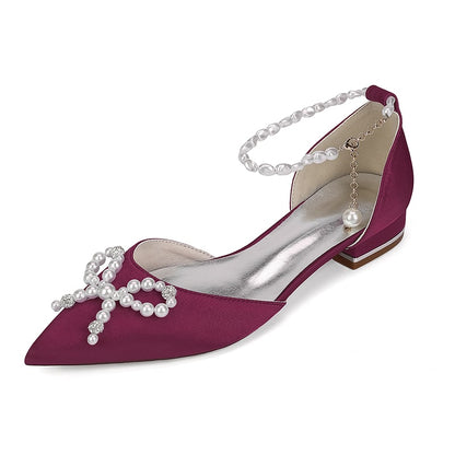 Elegant satin bridal flats with pearls in deep burgundy color featuring a decorative pearl strap