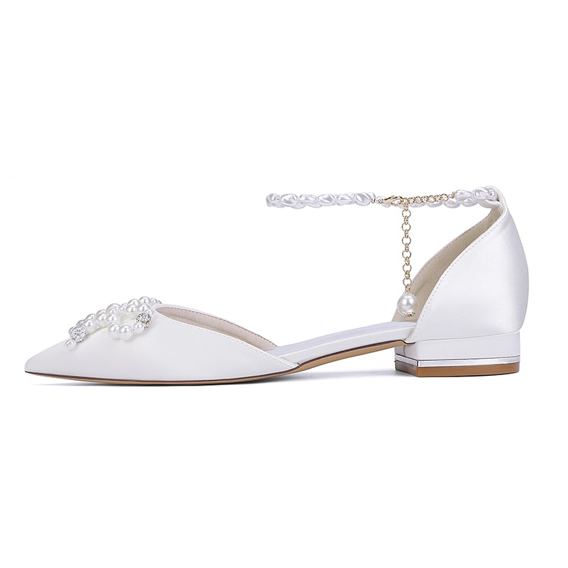 Elegant satin bridal flats with pearls featuring an ankle strap for a stylish wedding look