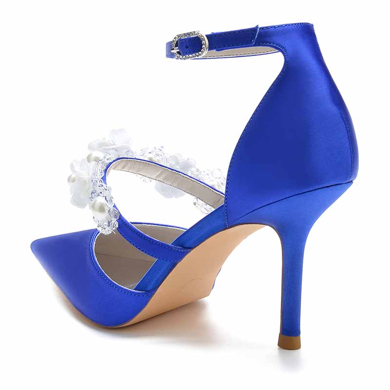 Elegant blue satin bridal heels with ankle strap featuring decorative floral embellishments