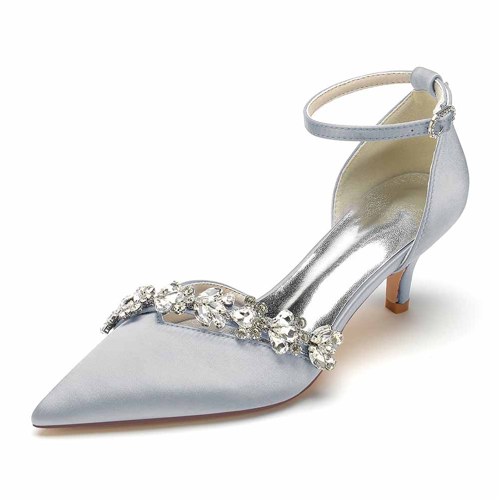 Elegant satin bridal heels with ankle strap featuring a detailed rhinestone embellishment, perfect for weddings