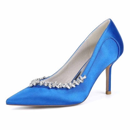 Elegant satin bridal heels with crystal beading in blue color, perfect for weddings or special occasions.