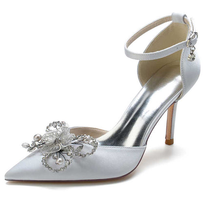Elegant satin bridal heels with crystals and floral embellishments for a stunning wedding look