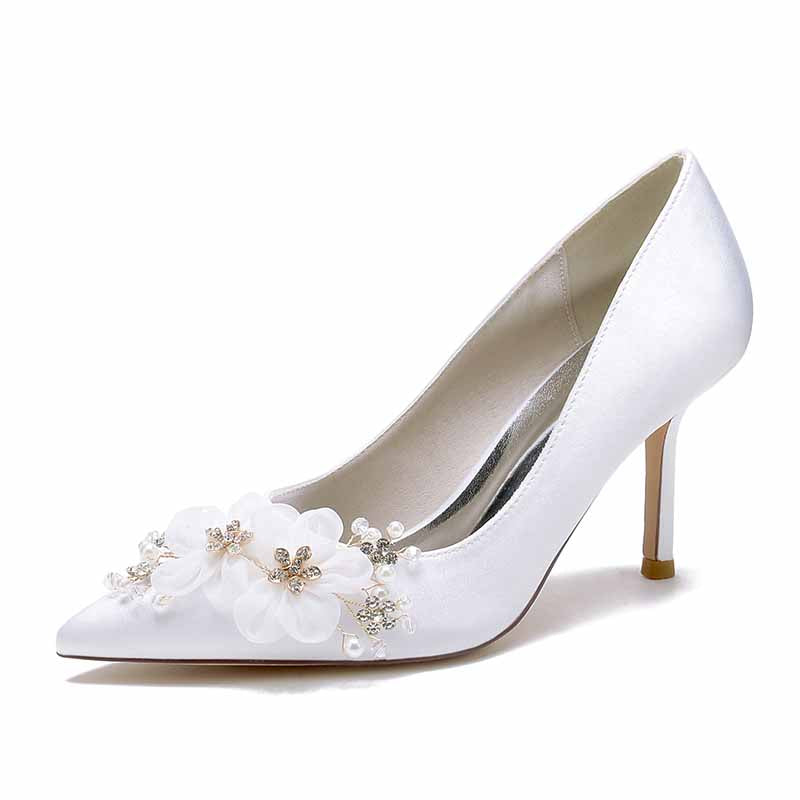 White satin bridal heels with rhinestones and floral embellishments for weddings