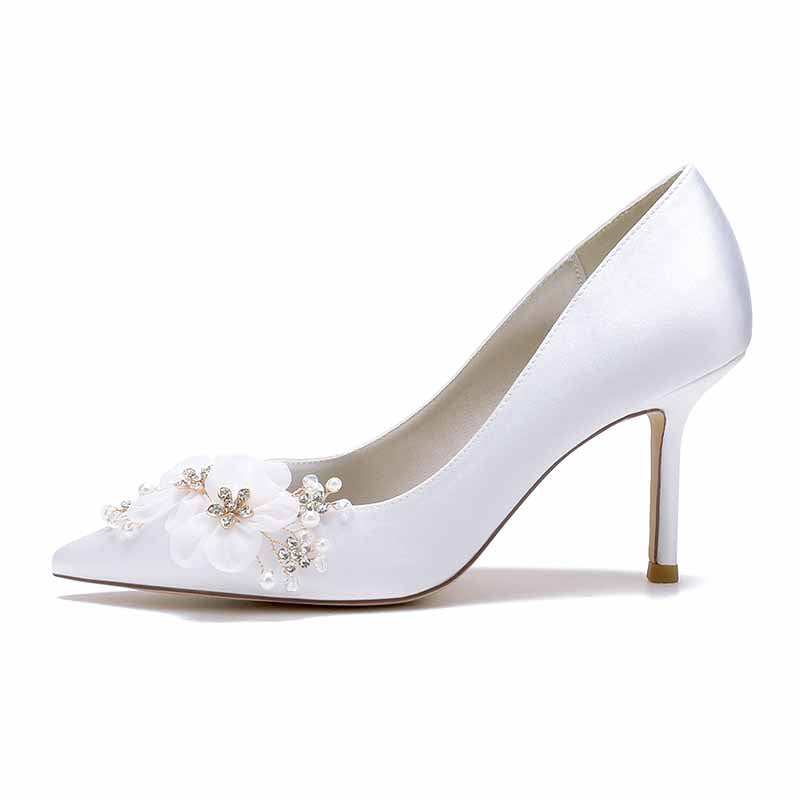 Elegant satin bridal heels with rhinestones and floral embellishments for a stylish wedding look