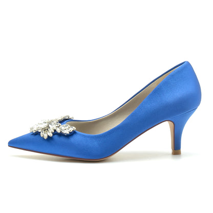 Elegant blue satin bridal pumps with crystal bow embellishment for a stunning wedding look