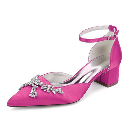 Pink satin bridal shoes with rhinestones featuring a block heel and ankle strap for elegant weddings