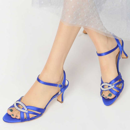 Elegant blue satin dress sandals for women with decorative straps and a low heel