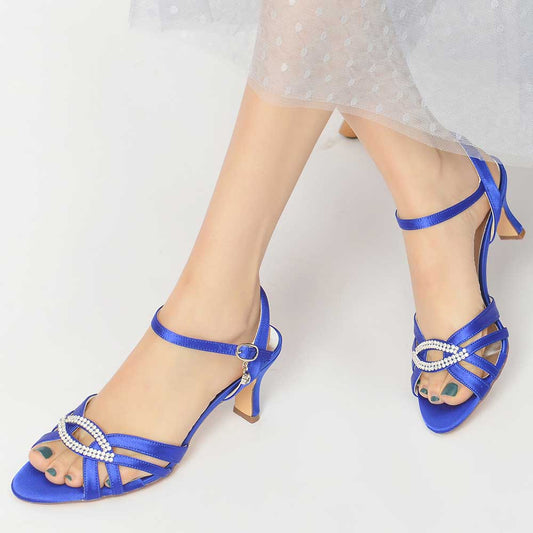 Elegant blue satin dress sandals for women with decorative straps and a low heel