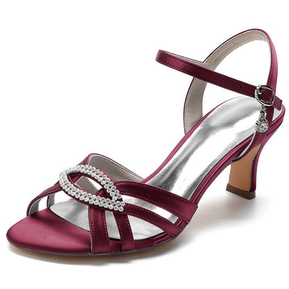 Elegant burgundy satin dress sandals for women with decorative crystal straps and a stylish heel