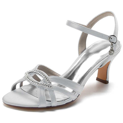 Elegant silver satin dress sandals for women featuring a sparkling rhinestone detail