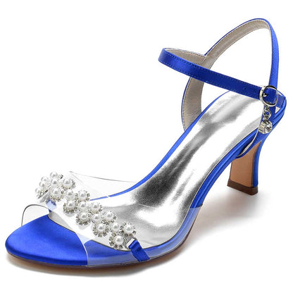 Elegant satin heeled sandals with pearls featuring a blue design and ankle strap for stylish occasions