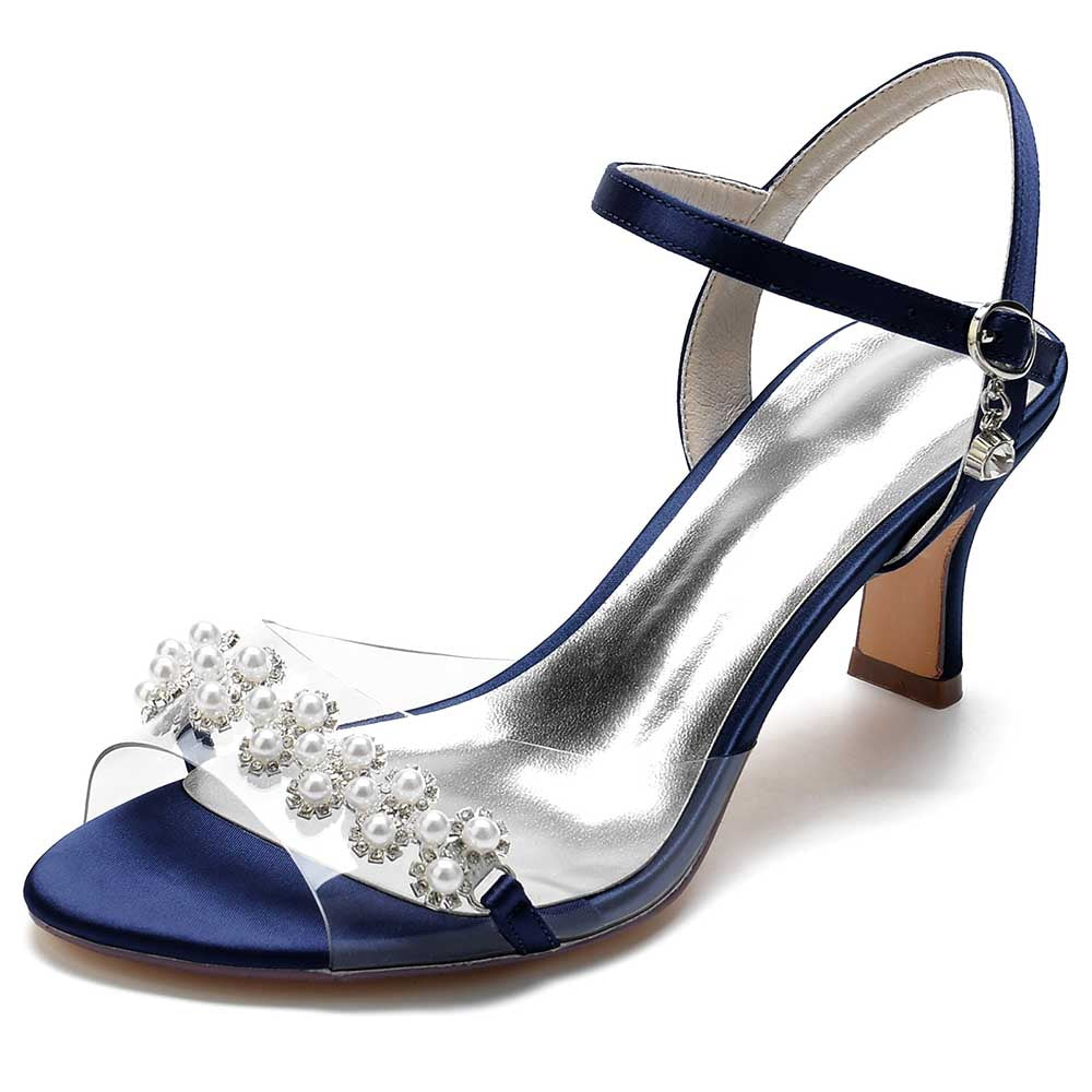 Elegant satin heeled sandals with pearls in navy blue featuring a transparent strap and chic design