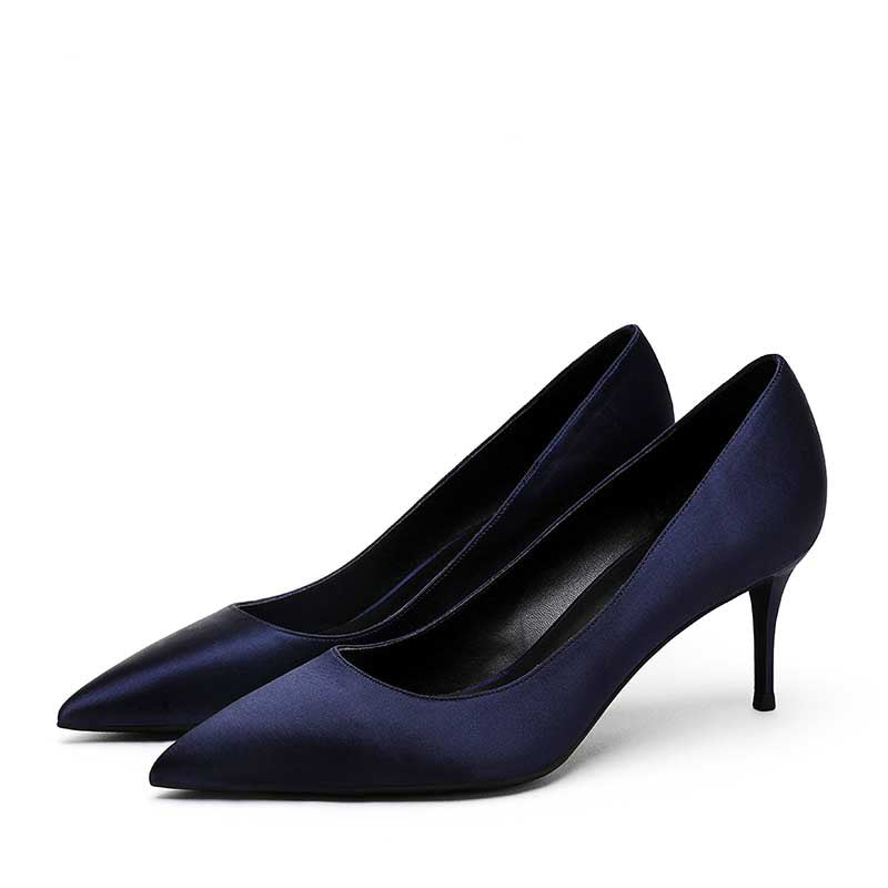 Elegant satin low heel party shoes in nude with a sleek pointed toe design for stylish events