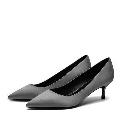 Elegant gray satin low heel party shoes with a pointed toe design for stylish events