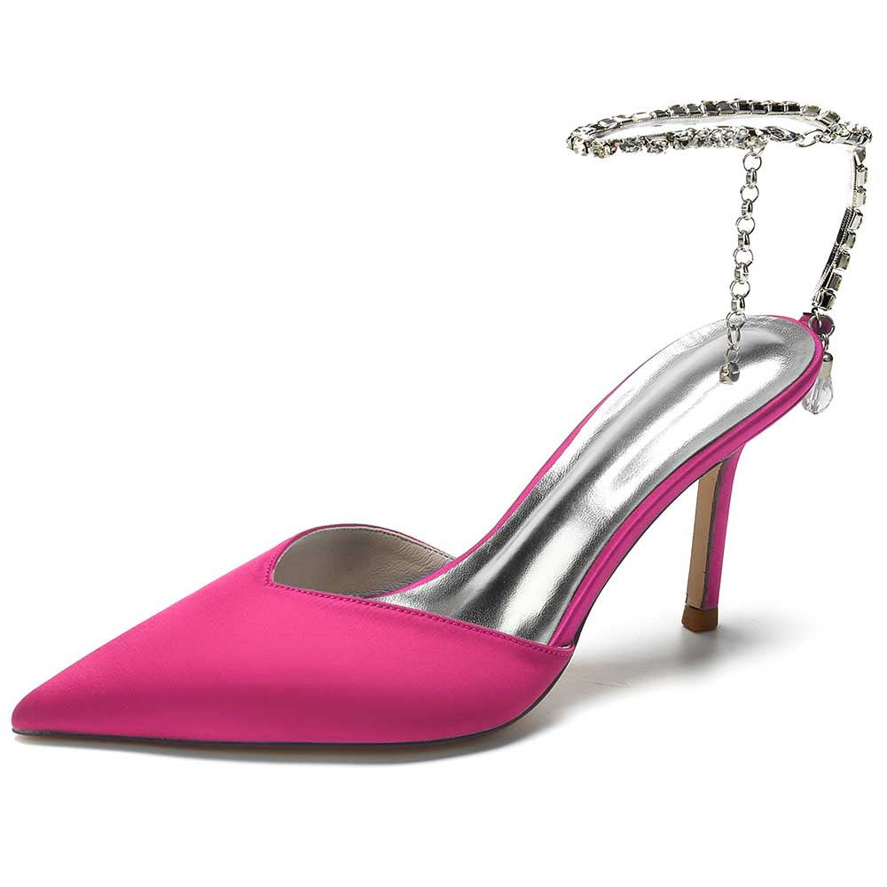 Pink satin prom heels with bling straps, featuring a pointed toe and elegant design for formal occasions