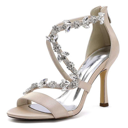 Elegant satin rhinestone wedding heels with intricate embellishments and a stylish design