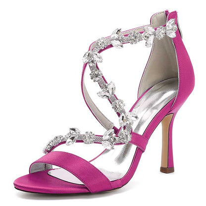 Pink satin rhinestone wedding heels with elegant floral embellishments and high stiletto heel