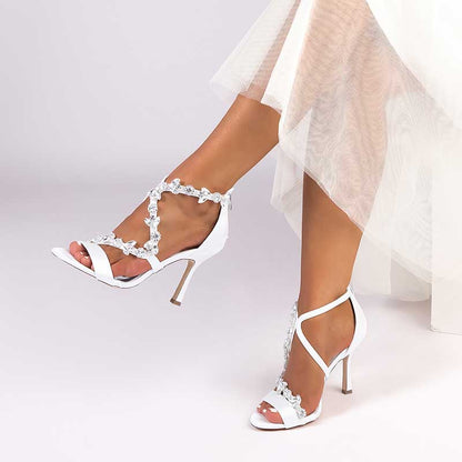 Elegant satin rhinestone wedding heels with a delicate ankle strap and sparkling embellishments