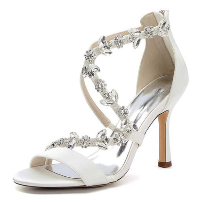 Elegant satin rhinestone wedding heels with floral embellishments and stiletto heel