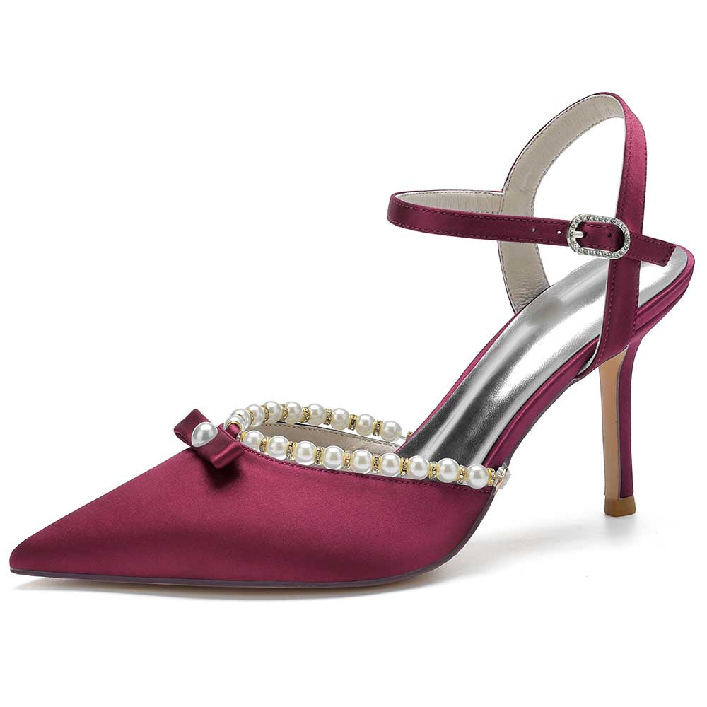 Elegant burgundy satin stiletto heels with pearls and an adjustable ankle strap for a glamorous look