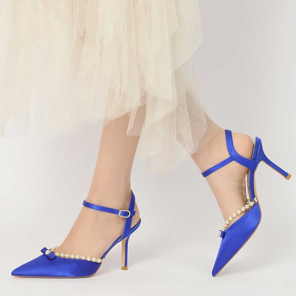 Elegant satin stiletto heels with pearls in blue, featuring an ankle strap and chic bow detail