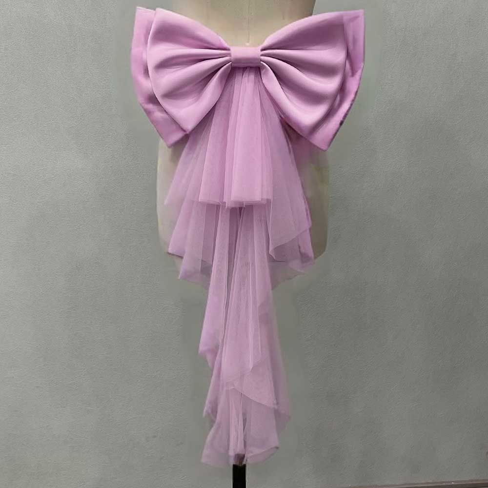 Lilac satin wedding bow for bridal dress with flowing tulle tails for a romantic look