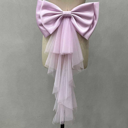 Elegant satin wedding bow for bridal dress with layered tulle cascading down for a romantic touch