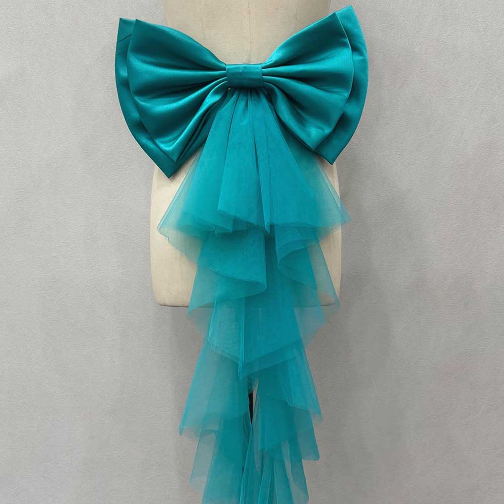Teal satin wedding bow for bridal dress with cascading tulle tail for a stunning bridal look