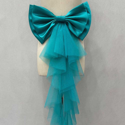 Teal satin wedding bow for bridal dress with cascading tulle tail for a stunning bridal look