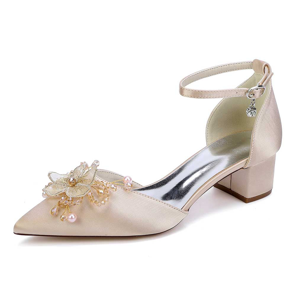 Elegant satin wedding shoes with ankle strap featuring floral embellishments and a low block heel