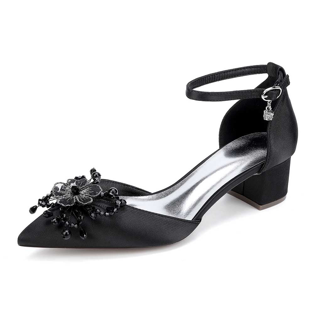 Elegant black satin wedding shoes with ankle strap and decorative flower detail for special occasions