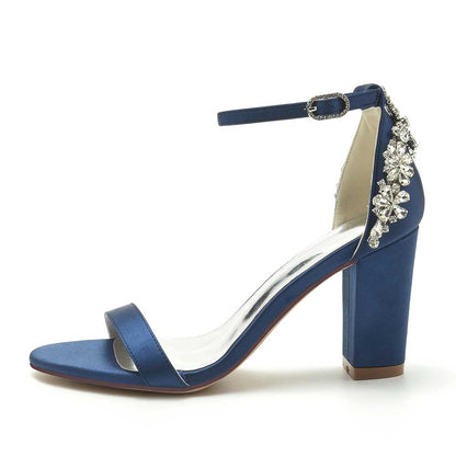Elegant blue wedding sandals for brides with ankle strap and sparkling embellishments