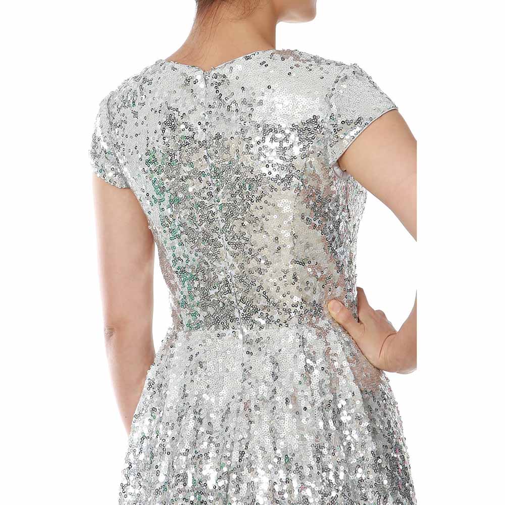 Back view of a sequin mother of the bride dress in silver, featuring cap sleeves and elegant shimmer