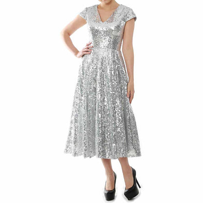 Elegant sequin mother of the bride dress in silver with cap sleeves and a flattering V neckline