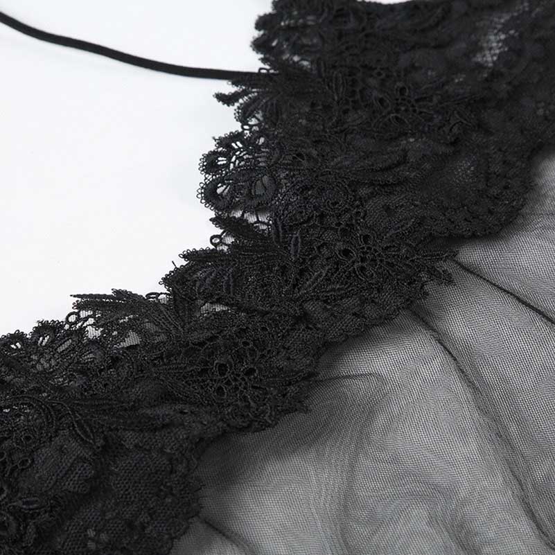 Close-up of black lace detailing on a sexy mesh lace mini dress from SD Dresscode & Fashiontrends