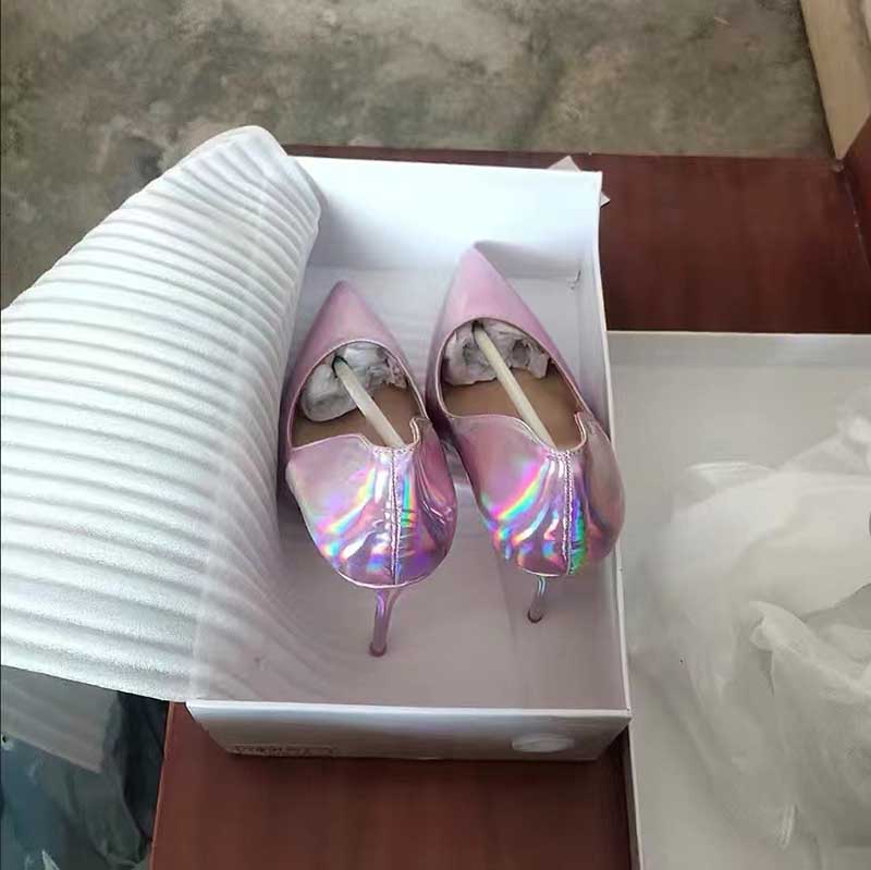 Shiny party heels for women in iridescent pink shade, elegantly packed in a box