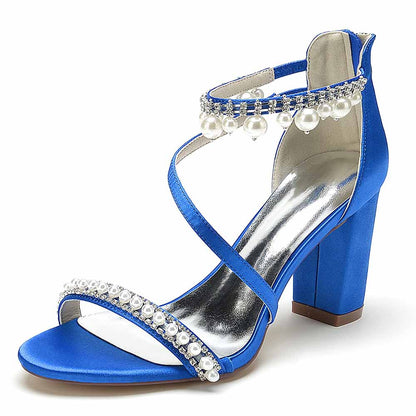 Elegant blue heels with pearl detailing, perfect shoes for wedding celebrations