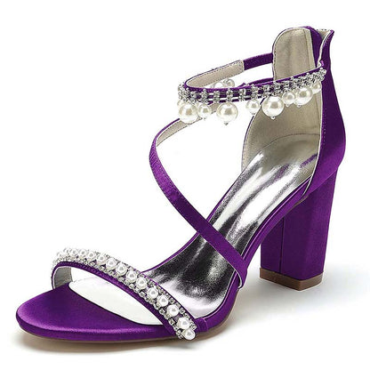 Purple S&DCo. heels with pearl embellishments, perfect shoes for wedding celebrations