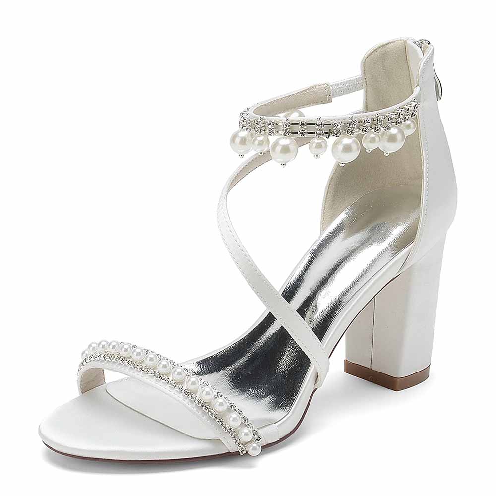 Elegant S&DCo. white heels with pearl detailing, perfect shoes for wedding celebrations