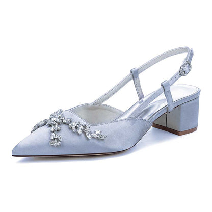 Elegant slingback wedding sandals with rhinestones in light blue featuring a pointed toe design
