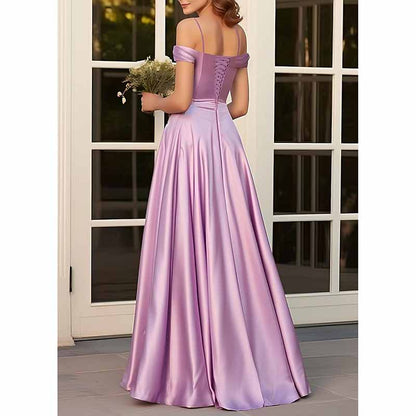 Elegant lavender spaghetti strap bridesmaid dresses with an off-shoulder design and flowing skirt