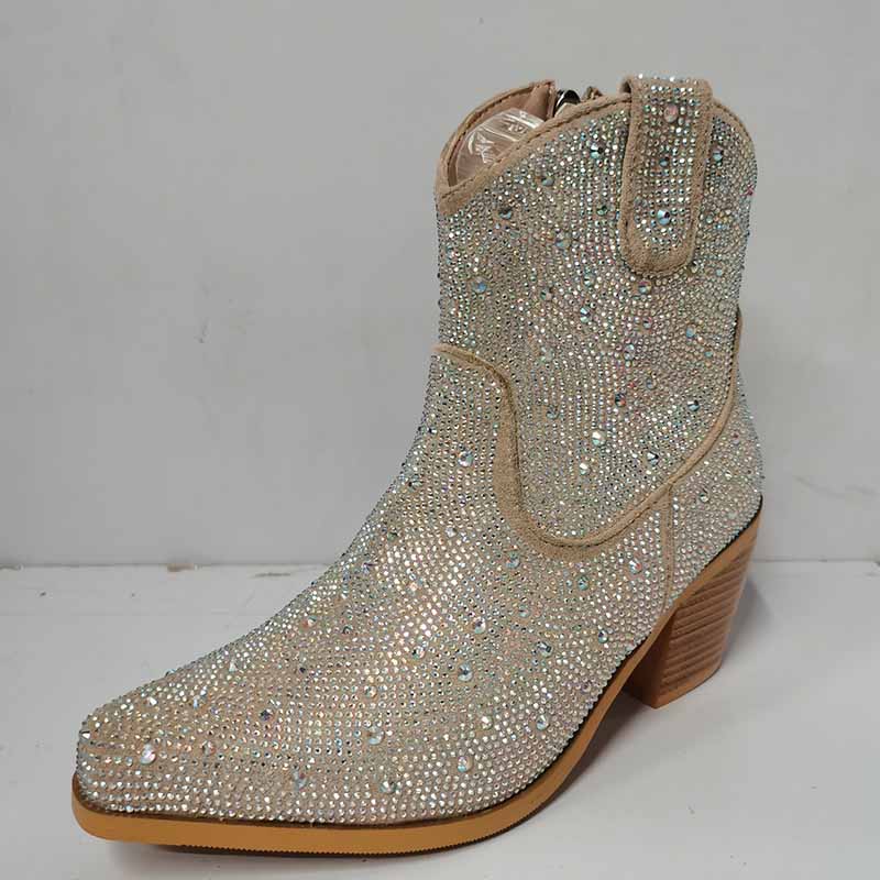 Sparkly cowboy boots by sd-hk with a dazzling rhinestone design for a stylish western look
