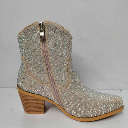 Sparkly cowboy boots featuring a stylish design with a side zipper and decorative embellishments