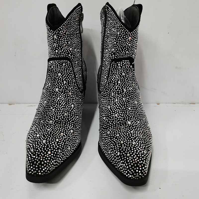 Stylish sparkly cowboy boots covered in rhinestones for a trendy western look