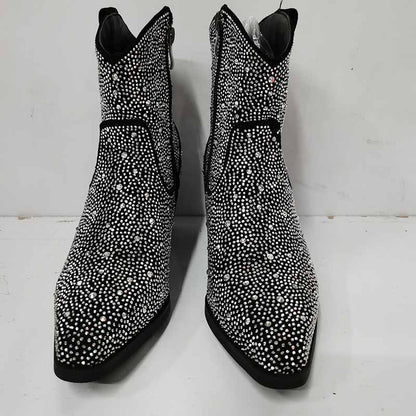 Stylish sparkly cowboy boots covered in rhinestones for a trendy western look