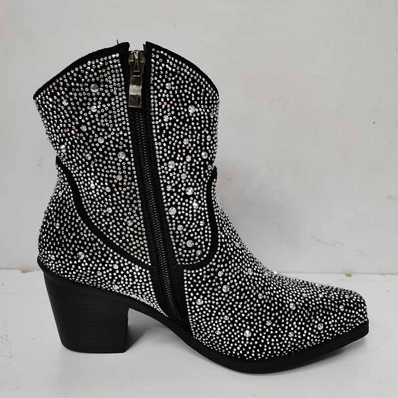 Sparkly cowboy boots with rhinestone embellishments and a stylish heel for a fashionable look