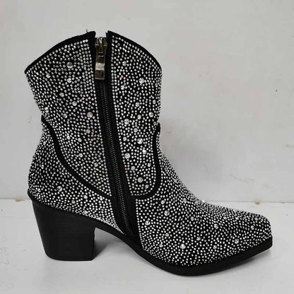 Sparkly cowboy boots with rhinestone embellishments and a stylish heel for a fashionable look